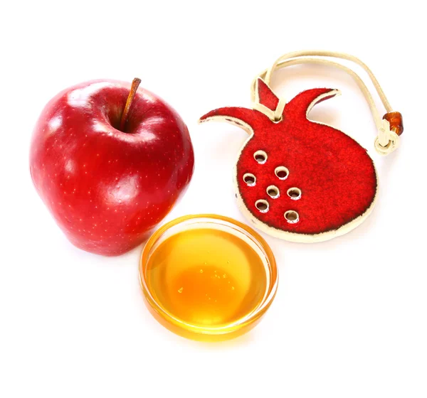 Jüdisches Neujahr - Rosch Haschana, Apfel mit Honig isoliert — Stockfoto