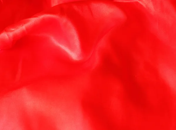 Red textured cloth as a background — Stock Photo, Image