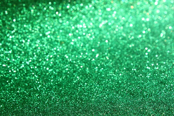 Abstrakt gröna glitter ljus eller jul bakgrund — Stockfoto