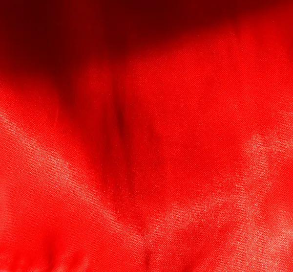 Red textured cloth as a background — Stock Photo, Image
