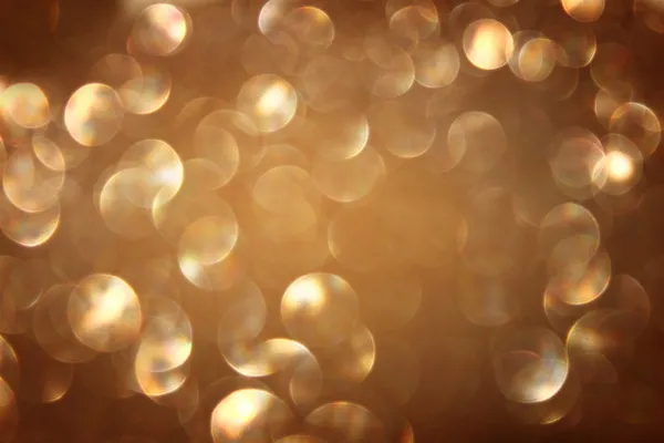 Golden christmas background or gold defoucsed lights background — Stock Photo, Image