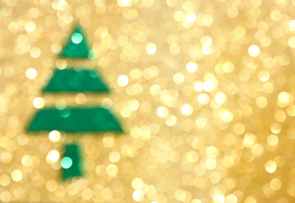 Christmas tree with defocused lights. golden background — Stock Photo, Image