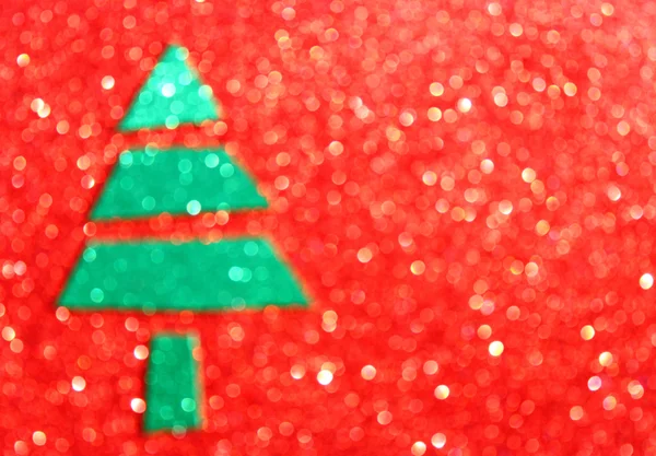 Christmas tree with defocused lights. Red background — Stock Photo, Image