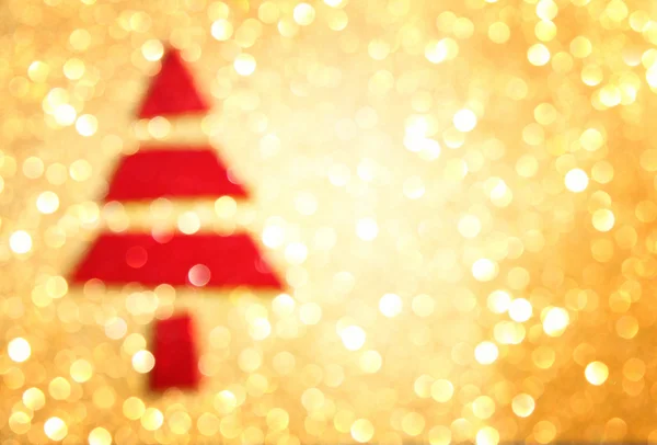 Ufuk ışık ile Noel ağacı. altın arka plan — Stok fotoğraf