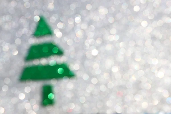 Christmas tree with defocused lights. silver background — Stock Photo, Image