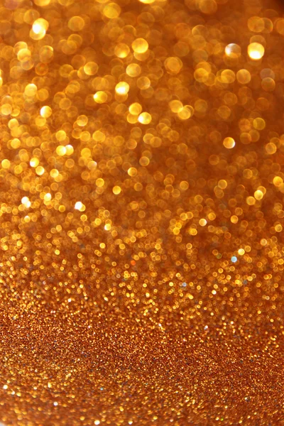 Fundo de Natal dourado ou ouro luzes desativadas fundo — Fotografia de Stock