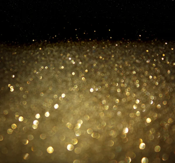 Golden background of defocused abstract lights. — Stock Photo, Image