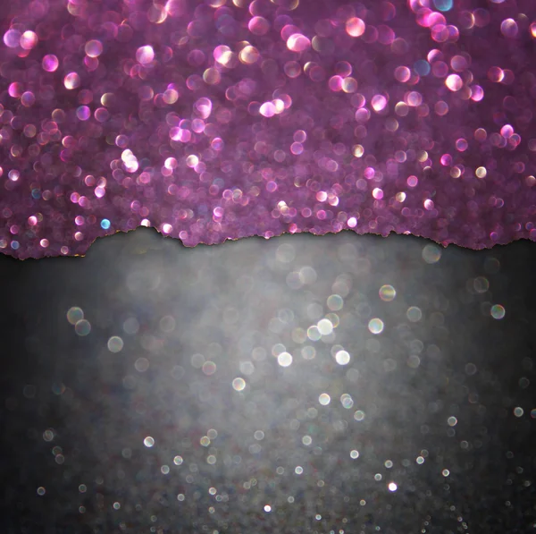 Black bokeh lights and purple torn paper — Stock Photo, Image