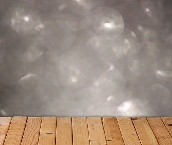 Silver Bokeh lights and wood floor boards — Stock Photo, Image