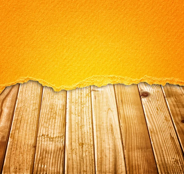 Vintage gescheurd papier over de achtergrond van de houten planken. warme Toon. — Stockfoto