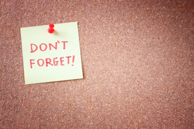 Dont forget or do not forget reminder, written on Yellow Sticker on Cork Bulletin or Message Board. clipart
