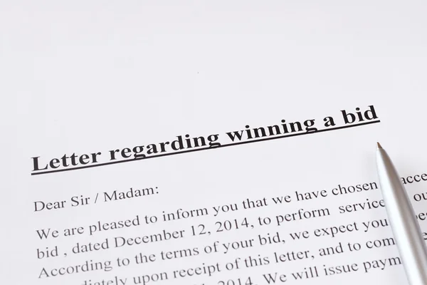 Letter regarding winning a bid or auction. business or finance concept — Stock Photo, Image