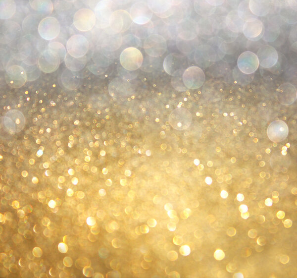 Golden background of defocused abstract lights. golden bokeh lights.