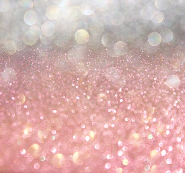 White silver and pink abstract bokeh lights. defocused background