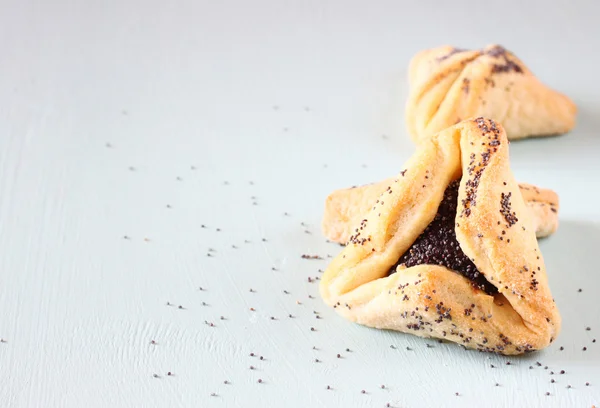 Hamantaschen cookie-k vagy a hamans fülek purim ünnep ünnepe — Stock Fotó