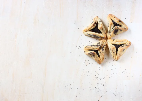 Hamantaschen cookie atau hamans telinga untuk perayaan liburan Purim. tampilan atas . — Stok Foto