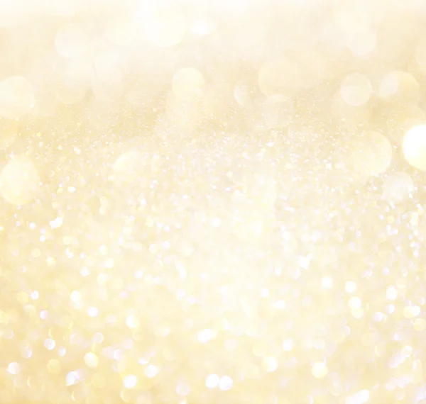 Weiße und goldene abstrakte Bokeh-Lichter. Defokussierter Hintergrund — Stockfoto