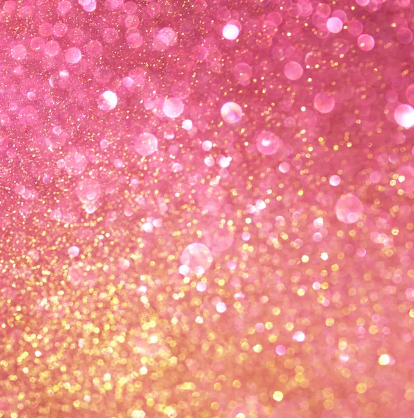 Ouro e rosa abstrato bokeh luzes. fundo desfocado — Fotografia de Stock