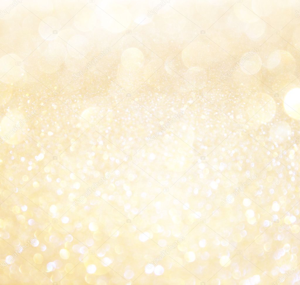 White and gold abstract bokeh lights. defocused background