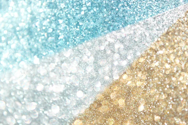 Glitter explosão de luzes desfocadas, ouro branco e azul — Fotografia de Stock