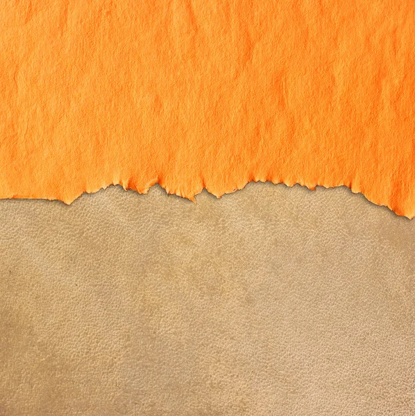 Torn vintage paper over leather textured background — Stock Photo, Image