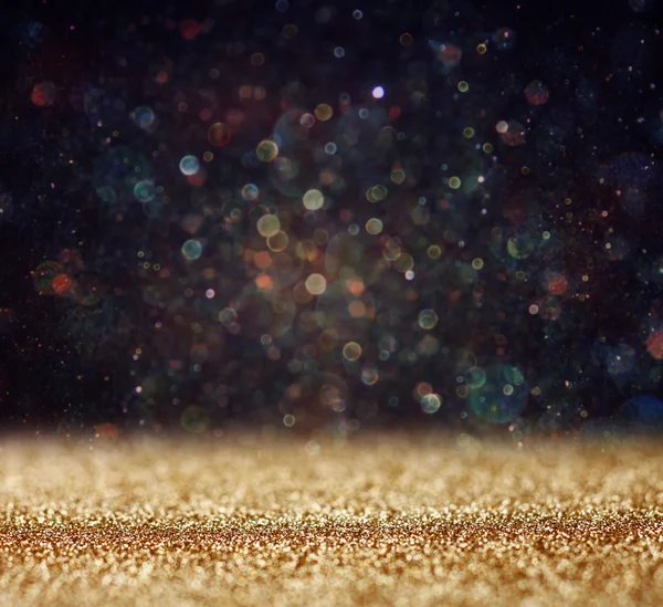 Glitter vintage ışıklar arka plan. ışık altın rengi ve siyah. defocused