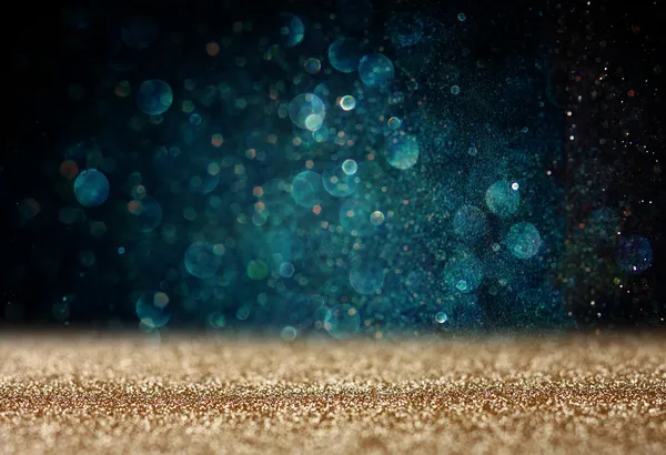 Glitter vintage lights background. light gold and blue. defocused. — Stock Photo, Image