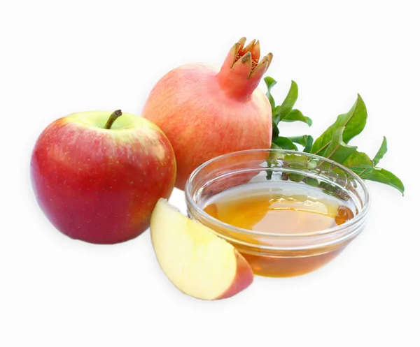 Rosh hashanah concept - apple honing en granaatappel geïsoleerd. traditionele vakantie symbolen. — Stockfoto