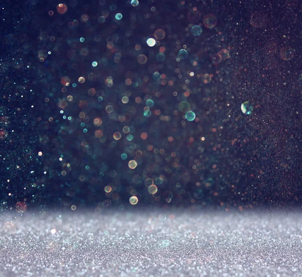 Glitter vintage lights background. light blue and black. defocused — Stock Photo, Image
