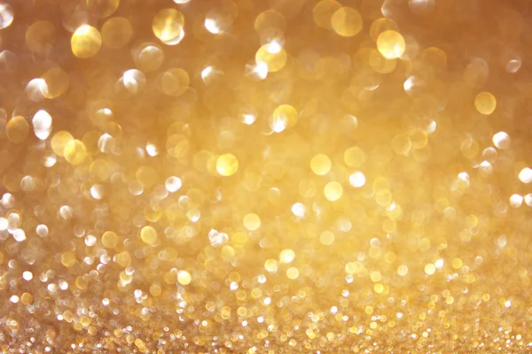 Glitter vintage lights background. light gold and black. defocused. — Stock Photo, Image