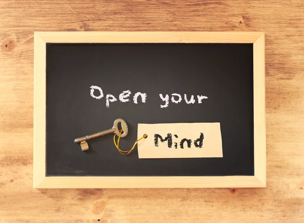 Open your mind written on blackboard — Stock Photo, Image