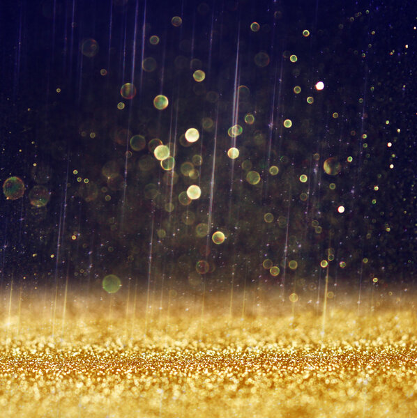 Блестящие винтажные огни фона. светлое золото и черное. defocused
.