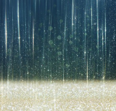 Glitter vintage ışıklar arka plan. ışık altın rengi ve siyah. defocused