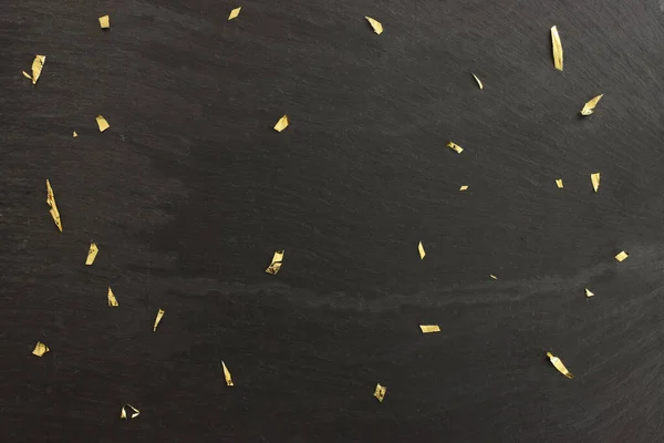 Zwarte Leisteen Gouden Confetti Achtergrond — Stockfoto