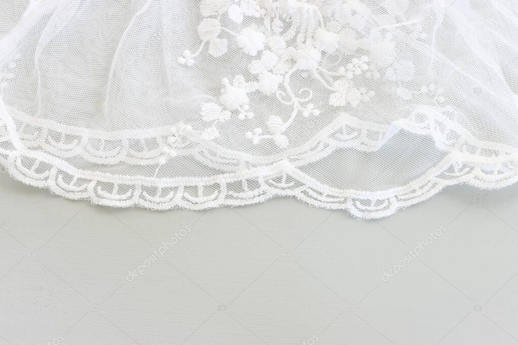 Background of white delicate lace fabric