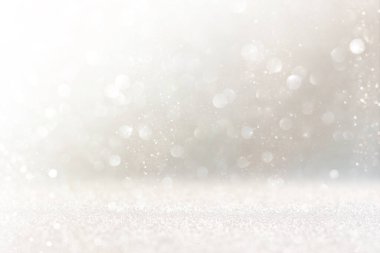 Soyut altın ve gümüş parıltılı ışıkların arkaplanı. Odaklanamadı