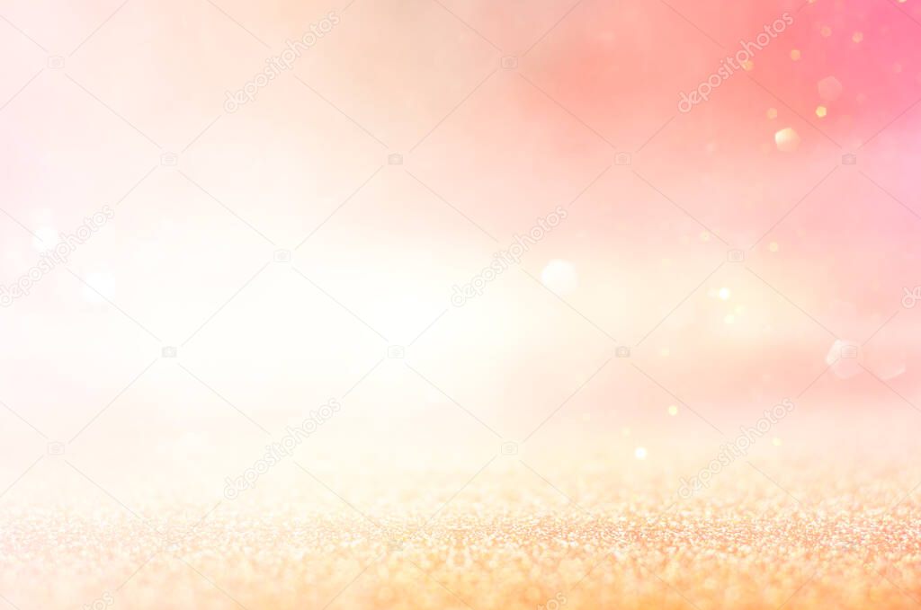 background of abstract gold and silver glitter lights. defocused