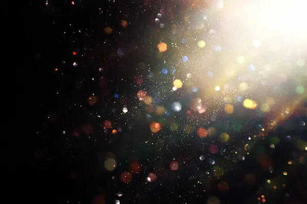 Achtergrond Van Abstract Goud Zwarte Glitter Lichten Gedeconcentreerd — Stockfoto
