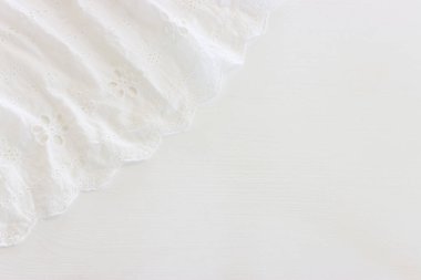 Beyaz işlemeli dantel kumaşın arka planı