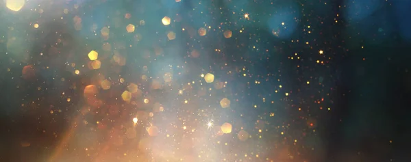 Background Abstract Glitter Lights Gold Blue Black Focused — Stock Photo, Image