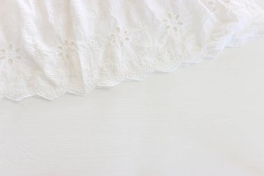 Beyaz işlemeli dantel kumaşın arka planı