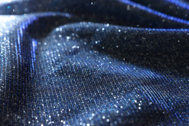 Parlak parıltılı saten kumaşın soyut görüntüsü