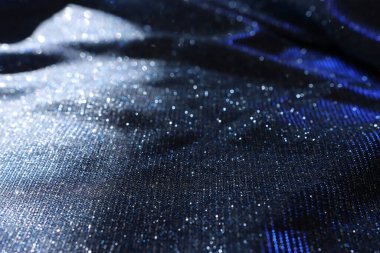 Parlak parıltılı saten kumaşın soyut görüntüsü