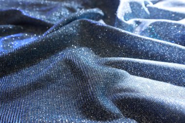 Parlak parıltılı saten kumaşın soyut görüntüsü