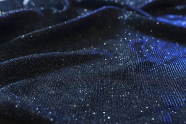 Parlak parıltılı saten kumaşın soyut görüntüsü