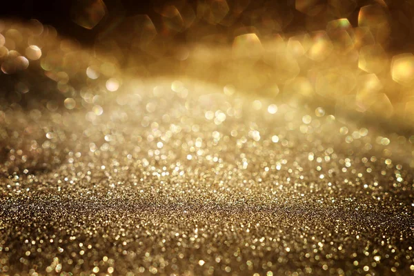 Achtergrond Van Abstract Goud Zwarte Glitter Lichten Gedeconcentreerd — Stockfoto