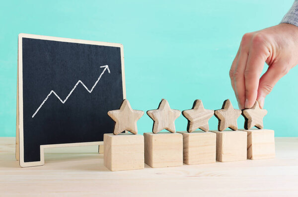 concept image of setting a five star goal. increase rating or ranking, evaluation and classification idea