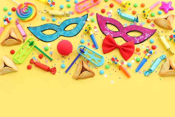 Purim Celebration Concept Jewish Carnival Holiday Yellow Background Top View — Stock Photo, Image