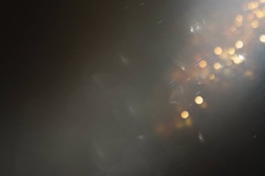 soyut glitter ışıkları arka plan. altın ve siyah. de odaklı