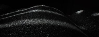 Soyut gümüş ve siyah parıltılı ışıkların arka planı. Odaklanamadı